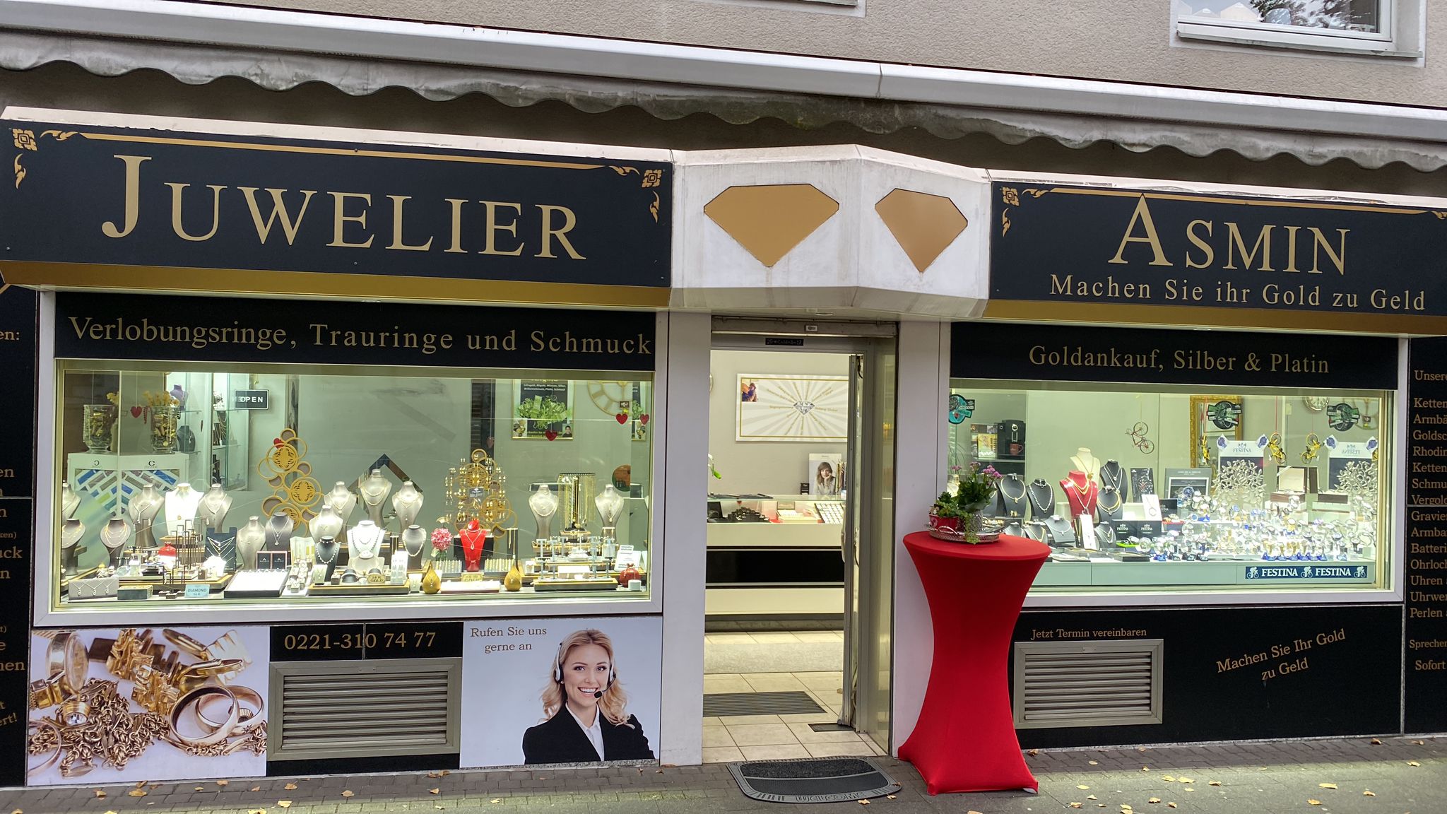 Ladenfront von Juwelier Asmin mit schwarzem Schild und goldener Schrift
